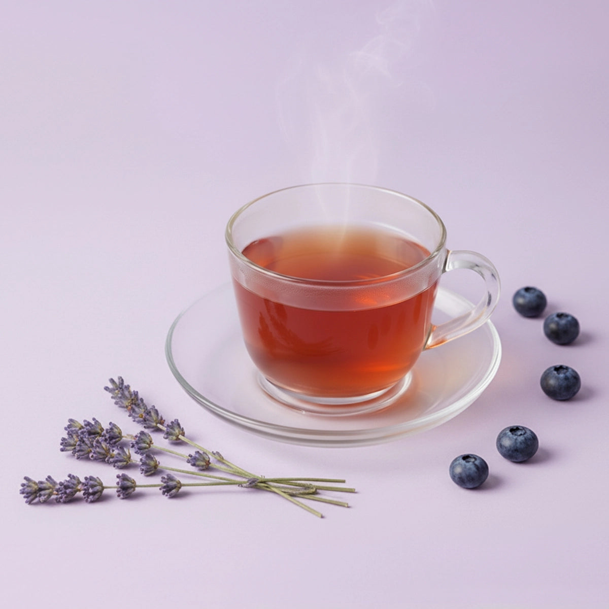 Freshly brewed Dakshin Blueberry Lavender Tea with blueberries and lavender buds